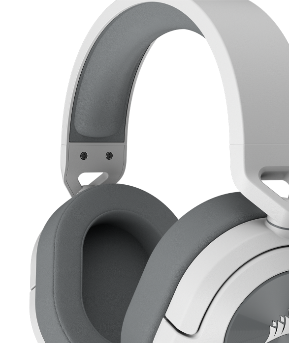 Close up of HS65 SURROUND wired gaming headset showing the breathable soft memory foam earpads. 