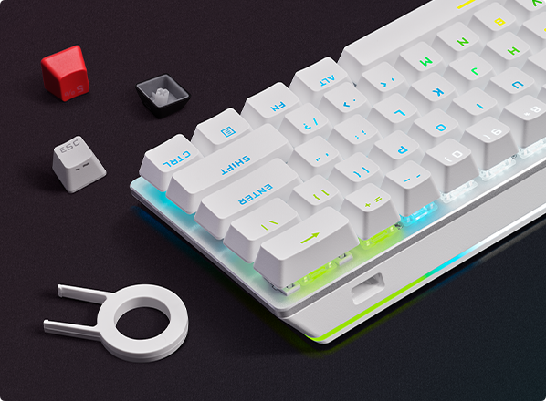Các keycaps tùy chỉnh bên cạnh bàn phím không dây 60%.
