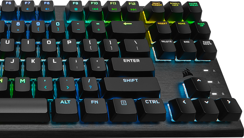 Close-up top-down shot of keyboard, with RGB lights shining brightly through.